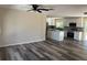 Open-concept floor plan showcasing the luxury vinyl plank flooring and modern kitchen at 4212 Pasadena Cir, Sarasota, FL 34233