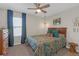 Inviting bedroom with a large window, stylish decor, and comfortable bedding for a peaceful retreat at 4639 Bexley Village Dr, Land O Lakes, FL 34638
