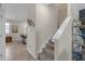 Inviting entryway showcases staircase, open dining area, and stylish decor, creating a warm and welcoming ambiance at 4639 Bexley Village Dr, Land O Lakes, FL 34638