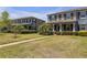 Attractive townhomes with well-maintained lawns and landscaping, enhancing the community's charm at 4639 Bexley Village Dr, Land O Lakes, FL 34638