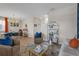 Open-concept living space with stylish furnishings, elegant decor, and seamless flow at 4639 Bexley Village Dr, Land O Lakes, FL 34638