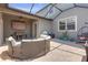 Cozy screened-in patio with comfortable seating, outdoor bar, and relaxing ambiance at 4639 Bexley Village Dr, Land O Lakes, FL 34638