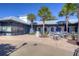 Outdoor community space with tables, chairs, and shaded seating areas, perfect for gatherings at 5313 Sanderling Ridge Dr, Lithia, FL 33547
