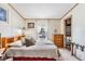 Comfortable bedroom features natural light and closet at 5524 Betmar Dr, Zephyrhills, FL 33542
