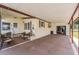 Covered parking area with ample space for vehicles and outdoor seating at 5524 Betmar Dr, Zephyrhills, FL 33542