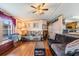 Cozy living room with comfortable seating and a view of the kitchen at 5524 Betmar Dr, Zephyrhills, FL 33542
