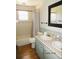 Bathroom with a shower/tub, toilet, and double sink at 5602 N Dormany Rd, Plant City, FL 33565