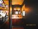 A half bath with wall decor and lighting at 5602 N Dormany Rd, Plant City, FL 33565