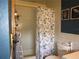 Bathroom featuring a shower/tub, toilet, and wall decor at 5602 N Dormany Rd, Plant City, FL 33565