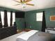 Bed room featuring a bed, ceiling fan, and natural light at 5602 N Dormany Rd, Plant City, FL 33565