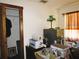 Bedroom featuring a closet, ample storage, and natural light, offering a functional living space at 5602 N Dormany Rd, Plant City, FL 33565