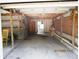 Spacious garage interior with ample room for parking and storage, offering versatility at 5602 N Dormany Rd, Plant City, FL 33565