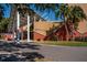 View of Dunedin Fine Art Center, showcasing its modern architecture and landscaping at 621 Duchess Blvd, Dunedin, FL 34698