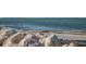 Beach view of water and exposed beach at 621 Duchess Blvd, Dunedin, FL 34698