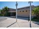 Exterior shot of the Dunedin Community Center with palm trees and a landscaped entrance at 621 Duchess Blvd, Dunedin, FL 34698