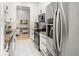 Stainless steel appliances complement this modern kitchen layout at 621 Duchess Blvd, Dunedin, FL 34698