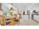 Bright dining area situated between the kitchen and living spaces at 633 Soundview Dr, Palm Harbor, FL 34683