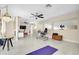 Spacious office area with white floors and ample natural light at 633 Soundview Dr, Palm Harbor, FL 34683