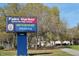 A sign showing Palm Harbor University High School and the address at 633 Soundview Dr, Palm Harbor, FL 34683