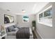 Serene bedroom with neutral walls, ample natural light, and stylish decor creating a cozy retreat at 7926 Gulf Way, Hudson, FL 34667