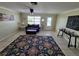 Comfortable living room with neutral decor, a sofa, and plenty of space for entertaining at 9035 37Th N St, Pinellas Park, FL 33782