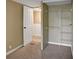 Bedroom closet next to open doorway, featuring wire shelving for efficient storage solutions at 9132 Mango St, New Port Richey, FL 34654