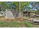 Residential home, set back with generous lot featuring mature trees, provides a sense of privacy at 9132 Mango St, New Port Richey, FL 34654
