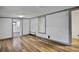Bright living room featuring stylish floors and closet at 9132 Mango St, New Port Richey, FL 34654