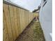 Backyard with newly installed wooden fence for privacy at 9818 White Barn Way, Riverview, FL 33569