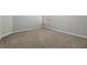 Spacious bedroom with plush carpeting, light gray walls, and a large window at 9818 White Barn Way, Riverview, FL 33569
