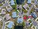 Bird's eye view of the neighborhood featuring homes and a lake at 1002 Strawpocket Pl, Sun City Center, FL 33573