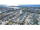 Expansive aerial view showcasing the waterfront community with canal access to the open ocean at 1015 Spindle Palm Way, Apollo Beach, FL 33572