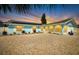 Inviting home boasting a well-maintained exterior, solar panels, and tasteful landscaping at 1015 Spindle Palm Way, Apollo Beach, FL 33572