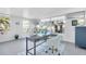 Home office with natural light, coastal decor, and a view of the backyard at 1015 Spindle Palm Way, Apollo Beach, FL 33572