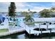 Beautiful waterfront home with private dock and boat lift, perfect for enjoying waterfront living at 1015 Spindle Palm Way, Apollo Beach, FL 33572
