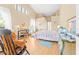 Bright bedroom featuring vaulted ceilings, natural light, and warm wood flooring at 11284 Hickory Ridge Ct, Spring Hill, FL 34609