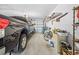 Attached garage with room for truck, bicycles, and organized storage at 11284 Hickory Ridge Ct, Spring Hill, FL 34609