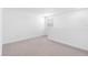 Cozy bedroom with neutral carpet and a window for natural light at 124 Hallam Ct, Spring Hill, FL 34606