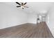 Spacious living room featuring modern flooring and ample natural light at 124 Hallam Ct, Spring Hill, FL 34606