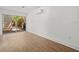 Bonus room features wood-look tile flooring, a slider door and mini-split AC unit at 125 29Th N St, St Petersburg, FL 33713