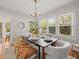 Light and airy dining room with a modern chandelier and bright natural light at 125 29Th N St, St Petersburg, FL 33713