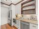 Modern kitchen with stainless steel appliances, granite countertops, and under cabinet lighting at 125 29Th N St, St Petersburg, FL 33713