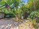 Seating area located in the lush backyard at 125 29Th N St, St Petersburg, FL 33713
