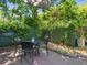 A seating area with lush backyard landscaping and a vintage wall at 125 29Th N St, St Petersburg, FL 33713