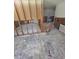 Empty living space in a home undergoing renovations, with exposed framing and concrete flooring at 1783 Mississippi Ne Ave, St Petersburg, FL 33703