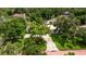 Aerial view of the property showcasing its landscaping and neighborhood at 1800 Mound S Pl, St Petersburg, FL 33712