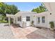 Attractive home exterior with a paved patio, ideal for outdoor enjoyment and entertaining at 1800 Mound S Pl, St Petersburg, FL 33712