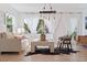 Bright living room with modern decor, natural light, and hardwood floors at 1800 Mound S Pl, St Petersburg, FL 33712