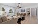 Sunlit living room featuring stylish furniture with a view to the bedroom at 1800 Mound S Pl, St Petersburg, FL 33712