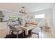 Open living space with modern furniture connecting to a spacious kitchen at 1800 Mound S Pl, St Petersburg, FL 33712